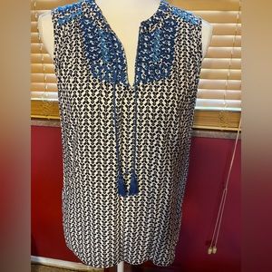 Beautiful sleeveless split-neck top